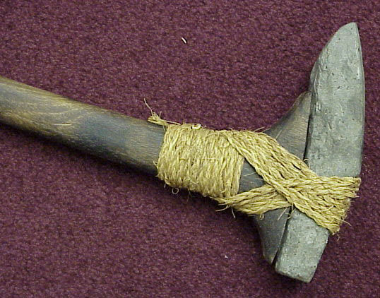 Hafted adzes from Hawai'i: left, a stone swivel adze, used for